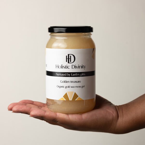 Majestic Treasure | Organic Gold Sea Moss Gel | Holistic Divinity | 550ml | Jar of gold seamoss gel in black person hand | Alkaline