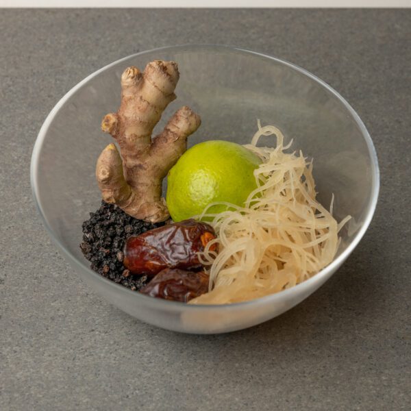 Immunity | Organic Gold Sea Moss Gel Herbal Infusion | Glass bowl with gold seamoss, lime, dates, elderberry, elderberries, ginger, alkaline